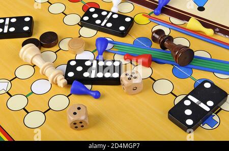 Various board games and many figurines background Stock Photo