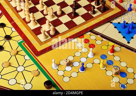 Various board games of ludo, halma, chess and fox and geese Stock Photo