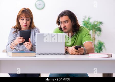 Students in gadget dependency concept Stock Photo