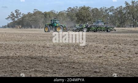 Devenish, Victoria / Australia - March 30 2020: Air seeder seeding a field near Devenish in Victoria Australia Stock Photo