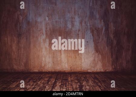 Stone wall and wooden floor background in warm colors Stock Photo