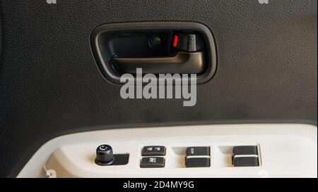 Close up of the inner door handles of modern cars Stock Photo