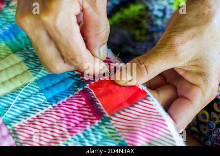 Quilt making by local women in Caohagan Island in Cebu Stock Photo