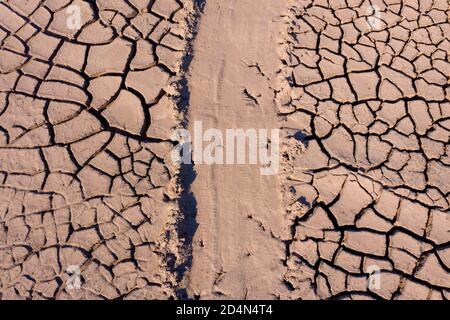 Dry lake bed with cracked Soil, Aerial view. Stock Photo