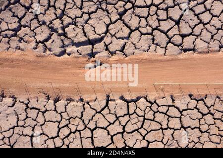 Dry lake bed with cracked Soil, Aerial view. Stock Photo