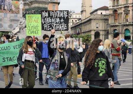 Milan (Italy), October 2020, the young people of Friday for Future, after the interruption due to Covid 19 epidemic, return to the streets to protest against climate change, trying to respect healt security measures. Stock Photo