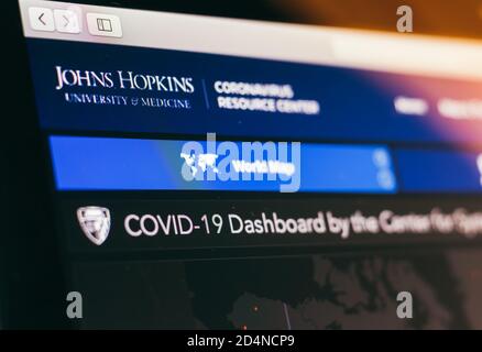 Johns Hopkins University COVID-19  Dashboard closeup on a monitor. Stock Photo