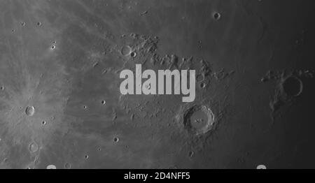 London, UK. 10 October 2020. Detailed images of the Moon are captured in very clear sky with no light pollution before dawn, and before clouds roll in after sunrise. Image: Crater Copernicus is bordered to the north by the Montes Carpatus mountain range with crater Eratosthenes towards right edge of frame and Mare Imbrium top of frame with the smaller crater Pytheus. Crater Kepler to left of frame with a large system of rays. Credit: Malcolm Park/Alamy Stock Photo