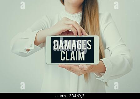 Text sign showing Damages Claim. Business photo showcasing seeks to repair the damages or liability of the victim party Model displaying black screen Stock Photo