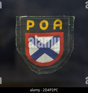 Sleeve patch of the Russian Liberation Army (ROA) also known as the Vlasov Army on display at the exhibition devoted to the Prague Uprising in May 1945 in the National Museum (Národní muzeum) in Prague, Czech Republic. Stock Photo