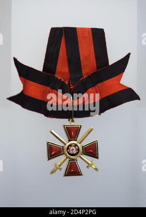 The cross of the Russian Imperial Order of Saint Prince Vladimir of the 4th Class with swords and a bow on display in the National Museum (Národní muzeum) in Prague, Czech Republic. Czechoslovak general Milan Rastislav Štefánik was awarded this order in 1916 during the First World War. The exhibition devoted to Milan Rastislav Štefánik runs in the National Museum till 29 August 2020. Stock Photo