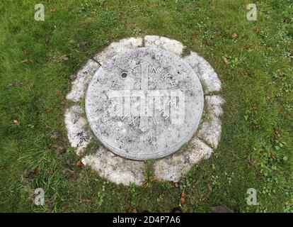 Memorial of novelist, historian and politician, John Buchan, 1st Baron Tweedsmuir, in the churchyard at Elsfield, Oxfordshire, UK Stock Photo