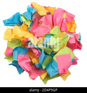 Used colorful stickers notes heap isolated on white. Top view. Stationery colored sticky notes. Stock Photo