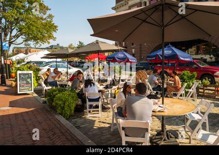 Baltimore, MD, USA -- Oct 4, 2020. Photo of people dining outdoors in the Fells Point neighborhood of Baltimore. Stock Photo