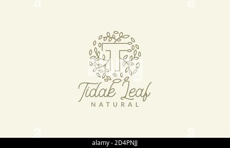 initial T or letter T with leaf  ornament on circle luxury modern logo vector icon illustration design Stock Vector