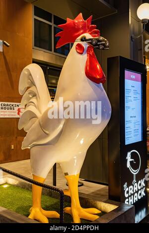 Las Vegas, SEP 25, 2020 - Chicken statue of Crack Shack wearing face mask Stock Photo