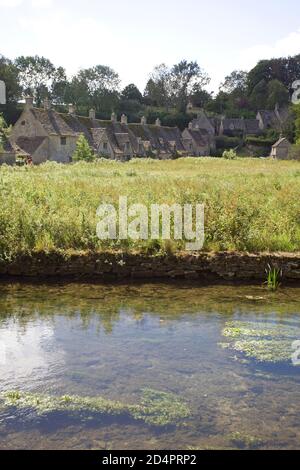 Picturesque cottages at Arlington Row in the Cotswolds village of Bibury, England Stock Photo