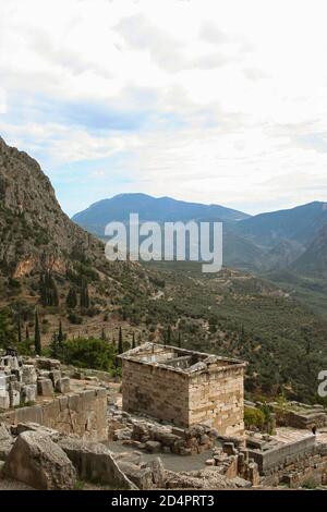 View of Delphi archaeological site in Greece looking towards the Treasury of the Athenians Stock Photo