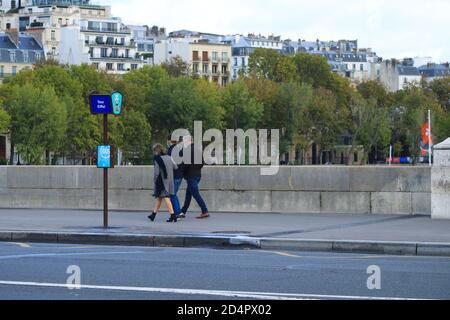 Paris, France. October 04. 2020. Tourists walking near the site of the Eiffel Tower. Famous place visited by foreigners. Stock Photo