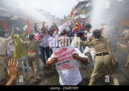 Police barricaded CITU's mass rally and protest. There was an 11-point demand, including a halt to the privatization of electricity. Police fired water cannons and used force against the protestors. October 2020. Agartala. Tripura, India. Stock Photo