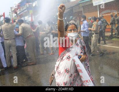 Police barricaded CITU's mass rally and protest. There was an 11-point demand, including a halt to the privatization of electricity. Police fired water cannons and used force against the protestors. October 2020. Agartala. Tripura, India. Stock Photo