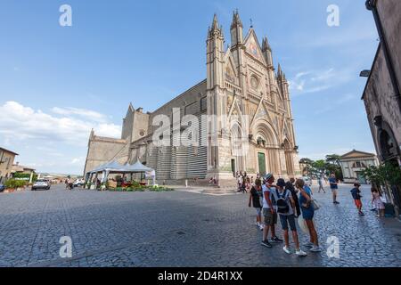 Orvieto, Italy. August 19, 2020: Orvieto Cathedral, famous Christian cathedral visited by many tourists. Large 14th-century Roman Catholic cathedral d Stock Photo