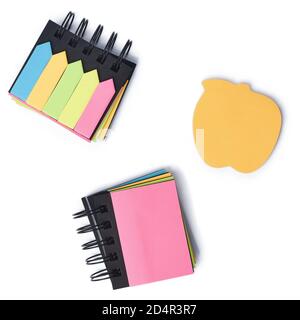 Block of colored note paper sticky stickers, object isolated on white background. Stack of notes. Top view. Stock Photo