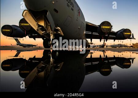 A C-17 Globemaster III assigned to the 911th Airlift Wing sits on the flightline at March Air Reserve Base, California, Jan. 8, 2020. The C-17 is capable of rapid strategic delivery of troops and all types of cargo to main operating bases or directly to forward bases in the deployment area. (U.S. Air Force photo by Joshua J. Seybert) Stock Photo