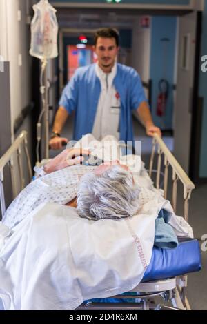 Elderly patient on a stretcher, Bordeaux hospital, France. Stock Photo