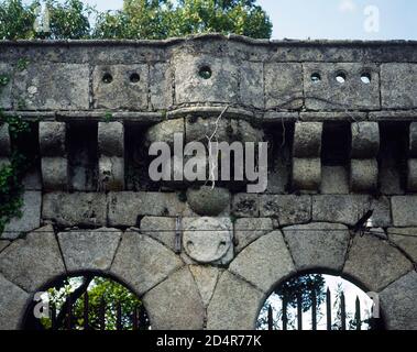 Spain, Community of Madrid, Cadalso de los Vidrios. Palace of Villena. It was built in 1423, on initiative of Alvaro de Luna, Duke of Trujillo and Constable of Castile, who used it as a summer residence. Renaissance style. It owes its name to the Marquis of Villena, Juan Fernandez Pacheco, who benefited from the fall from grace of Alvaro de Luna. Architectural detail of the southern facade, with semicircular arches. Stock Photo