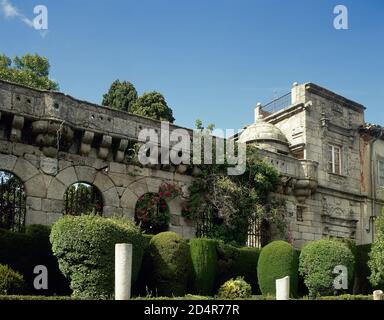 Spain, Community of Madrid, Cadalso de los Vidrios. Palace of Villena. It was built in 1423, on initiative of Alvaro de Luna, Duke of Trujillo and Constable of Castile, who used it as a summer residence. Renaissance style. It owes its name to the Marquis of Villena, Juan Fernandez Pacheco, who benefited from the fall from grace of Alvaro de Luna. Southern facade, with semicircular arches. Stock Photo