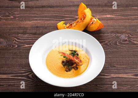 Pumpkin soup puree with bacon Stock Photo
