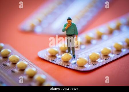 Illustration of contraceptive pill for man. Stock Photo
