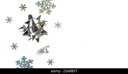 Flatley Christmas. Christmas or New Year composition with silver decorations on a white background. copyspace Stock Photo