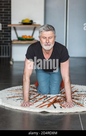 Man practicing yoga. Stock Photo