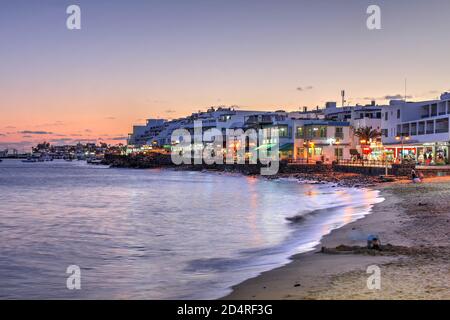 Sunset scene in Playa Blanca resort at twilight, located on the Lanzarote Island, Canary Islands, Spain. Stock Photo