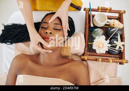 Lifting face massage Stock Photo