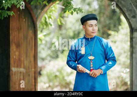 Vietnamese man in traditional dress Stock Photo