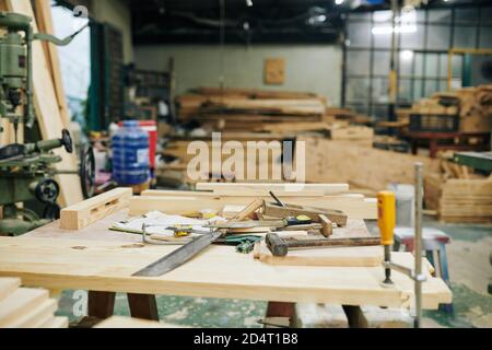 Workbench with various tools Stock Photo