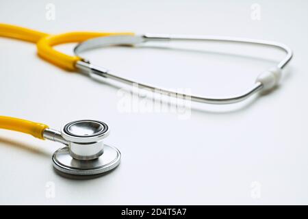 Doctor stethoscope lies on the table close up Stock Photo