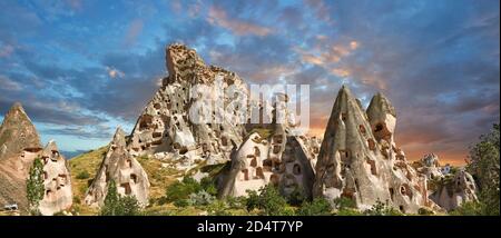 Pictures & images of Uchisar Castle the cave city houses in the fairy chimney of Uchisar, near Goreme, Cappadocia, Nevsehir, Turkey Stock Photo