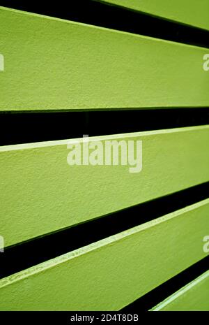 Lime green colored horizontal wooden fence background Stock Photo