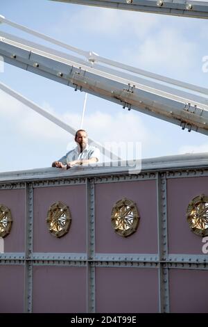 Bearded Man in Short Sleeves Standing on Bridge Stock Photo