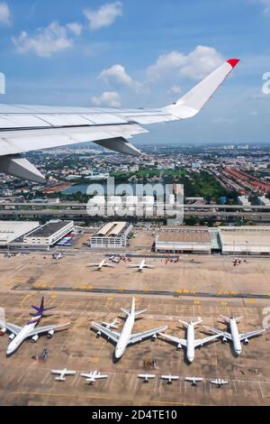 Flight takeoff from international airport, view from airplane window. Selective focus. Stock Photo