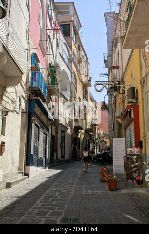 Procida, Province of Naples, Campania, Italy. Isle of Procida, Marina Grande. Marina Grande, the town of Procida with the main port of the island. Scenes of daily life in a street of the village. Stock Photo