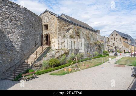 Huge and historic fortified castle - Château de Bouillon - dominates the town of Bouillon in the Belgian province of Luxembourg on the banks of Semois Stock Photo