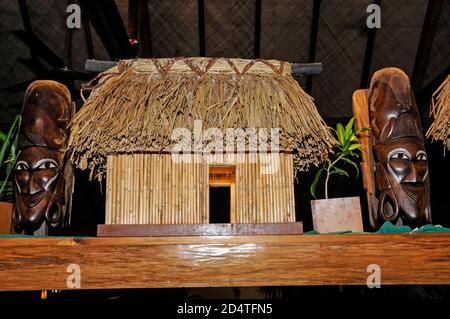 A model of thatched roof Fijian Bure ( old traditional houses) and a cold food buffet at the Outriggers Fji Beach Resort near Sigatoka on the island o Stock Photo