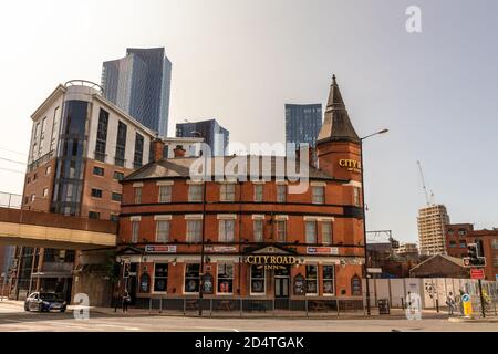 Historic building of The City Road Inn by Deansgate Locks an old survivor among tall modern buildings in the city centre. Stock Photo