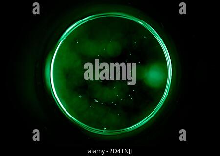Abstract circle on black background. Sphere in the dark. Stock Photo