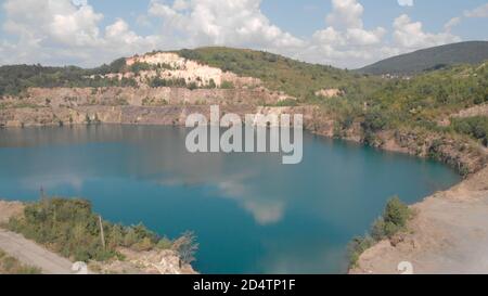 A dazzling lake in the quarry. Stock Photo